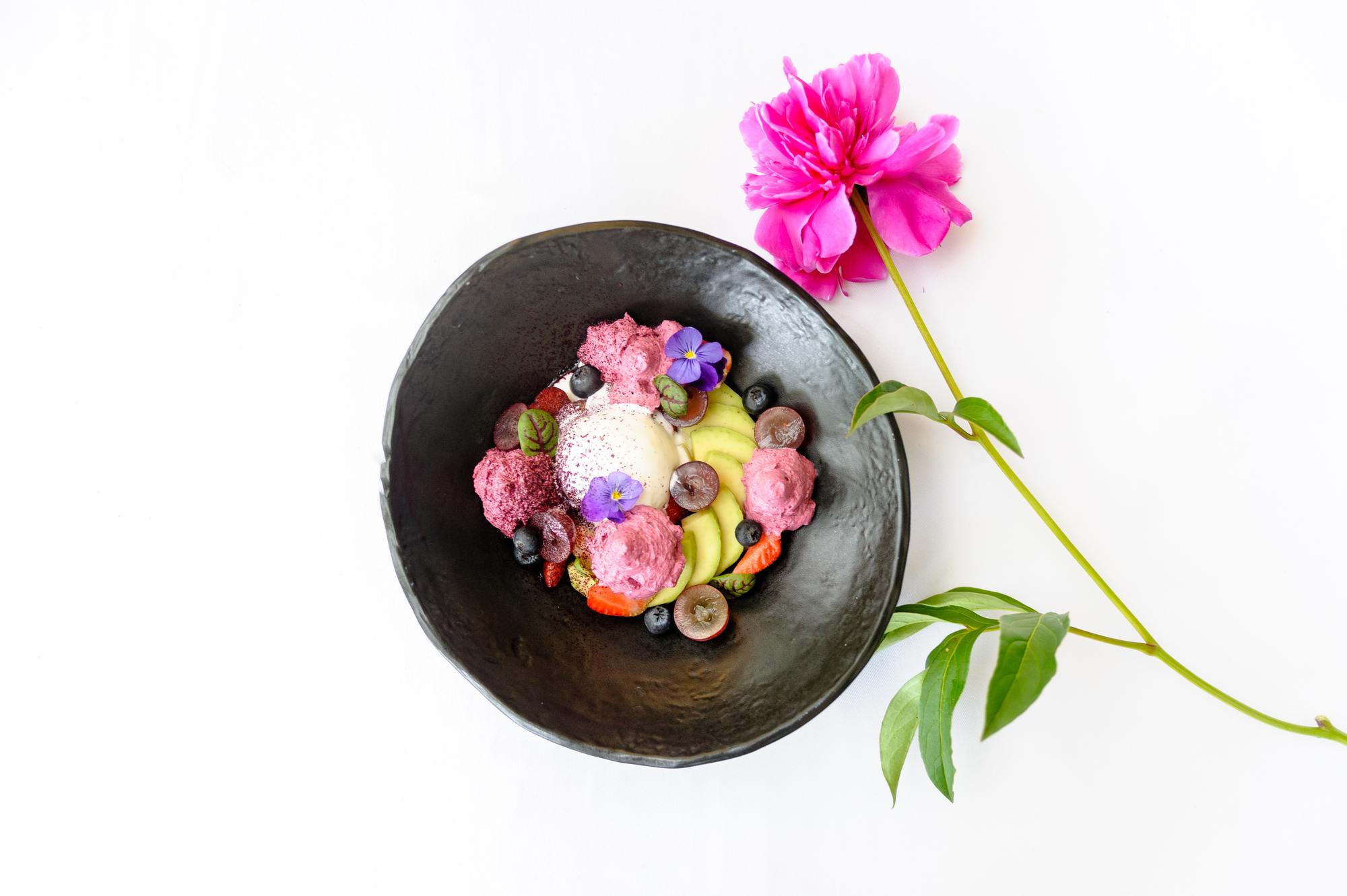 Plated seasonal salad with edible flowers